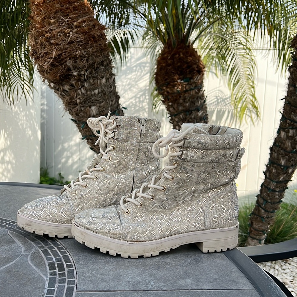 Sparkly lace up boot.